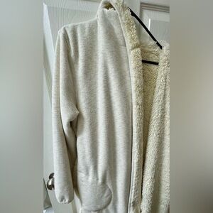 UGG Cozy Cream Fuzzy Fleece Robe with pockets and hood.